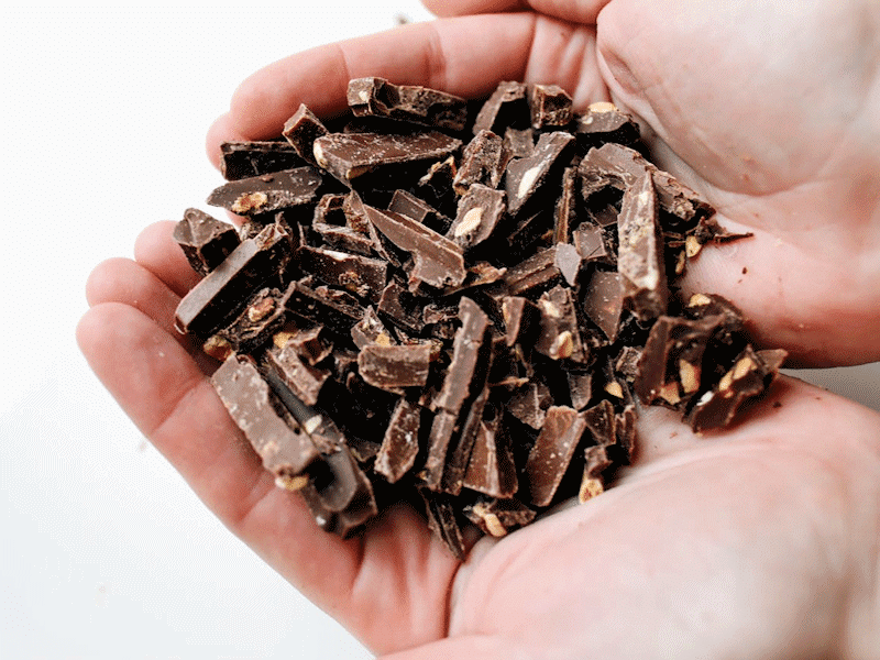 A handful of dark chocolate pieces.